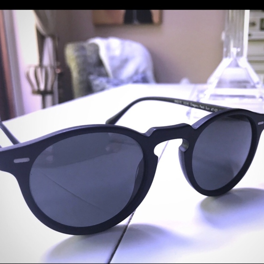 Oliver Peoples “Gregory Peck” 47 sunglasses.